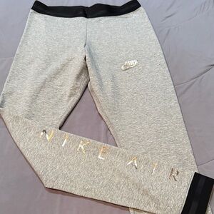 Nike Gray Joggers with Metallic Logo